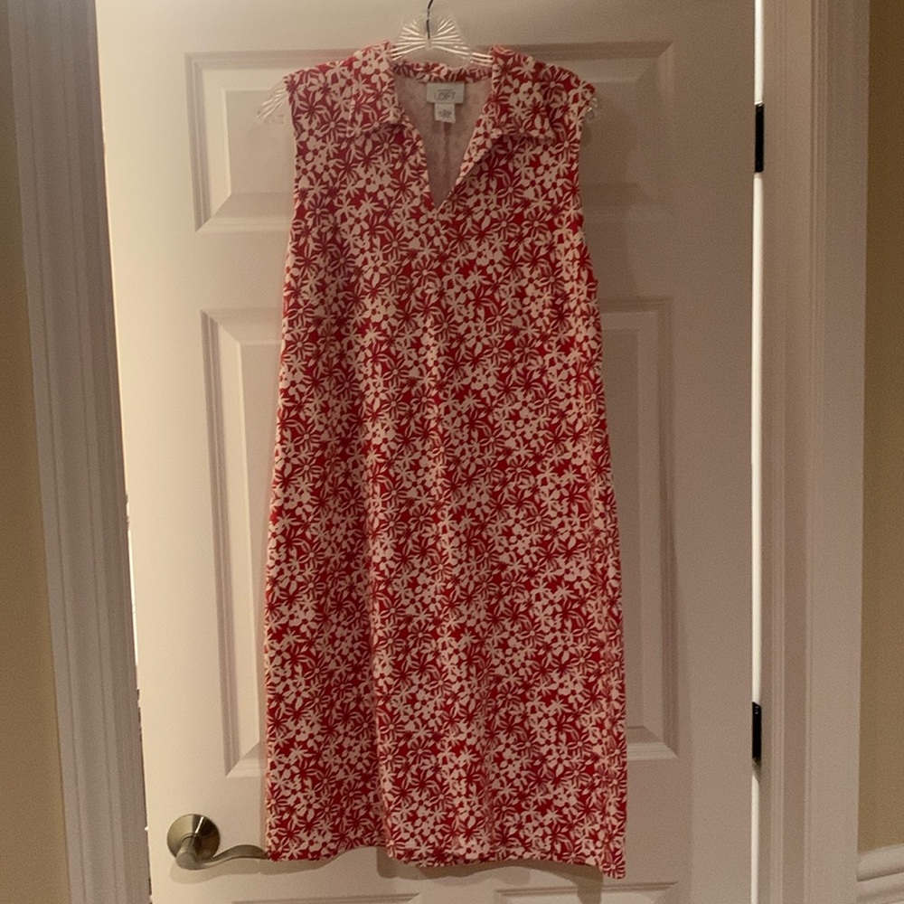 Red and white flowered dress.